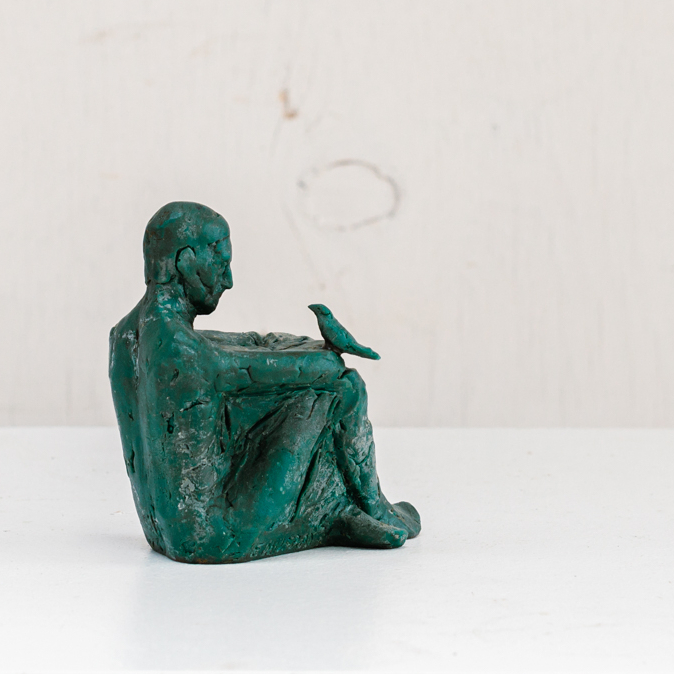 Bronze Man with Bird